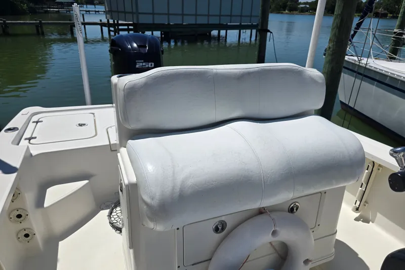 Slide: The Image of 2008 Triton 240 LTS Pro boat interior with seating and Yamaha 250 engine. - 24
