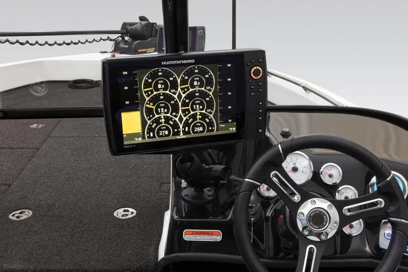 Slide: The Image of The image shows the cockpit of a 2019 Nitro ZV19 Pro boat with a modern control system. - 24