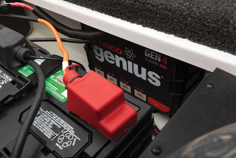 Slide: The Image of Close-up of a boat battery and charger inside a 2019 Nitro ZV19 Pro. - 25