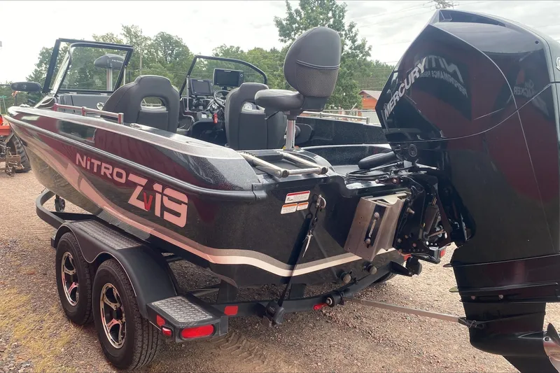 Slide: The Image of 2019 Nitro ZV19 Pro boat with Mercury engine on a trailer. - 4