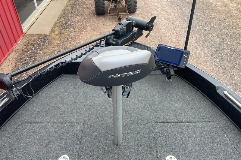 Slide: The Image of 2019 Nitro ZV19 Pro boat deck with trolling motor and fish finder. - 7