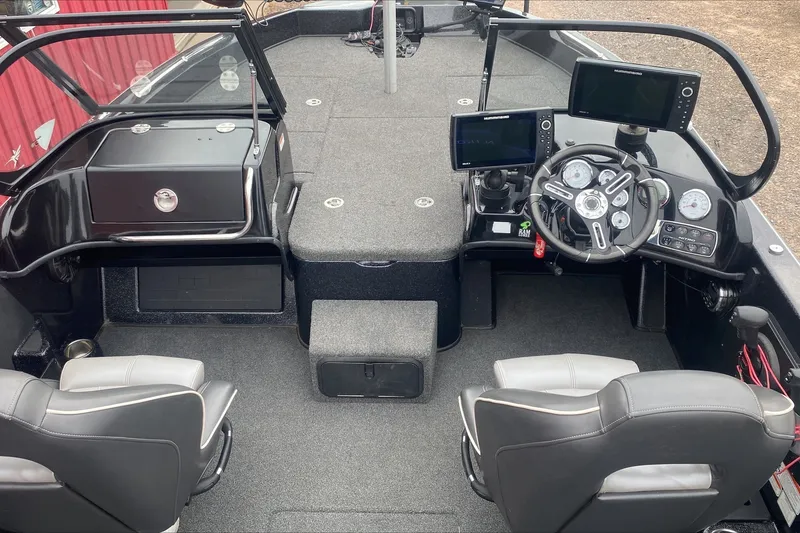 Slide: The Image of Interior of a 2019 Nitro ZV19 Pro boat with dual seats and modern dashboard. - 9