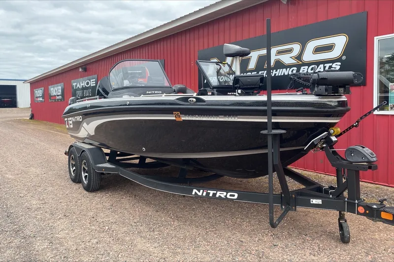 Slide: The Image of 2019 Nitro ZV19 Pro fishing boat on trailer outside dealership. - 1