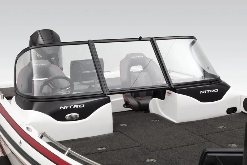 Slide: The Image of The image shows the cockpit of a 2019 Nitro ZV19 Pro boat with two seats and a helm. - 23