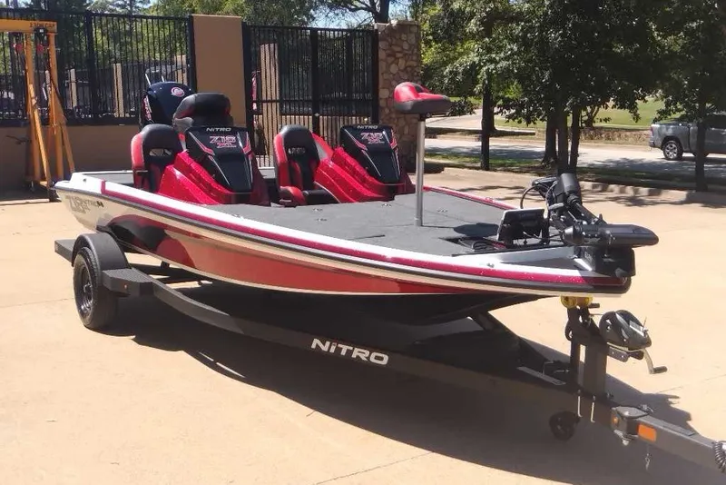 Slide: The Image of 2027 Nitro Z18 XL Pro fishing boat on trailer, parked outdoors. - 3