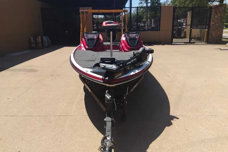 Slide: The Image of 2027 Nitro Z18 XL Pro boat on trailer, parked outdoors in sunlight. - 4