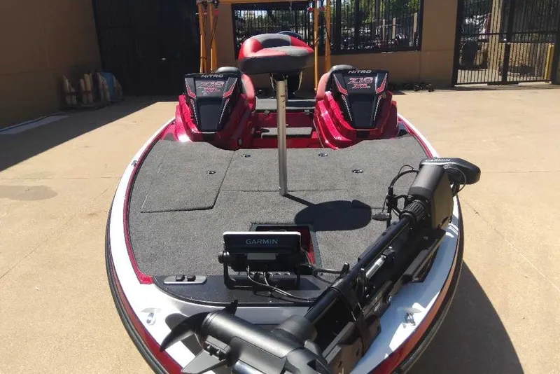 Slide: The Image of 2027 Nitro Z18 XL Pro boat with Garmin equipment, parked outdoors. - 9