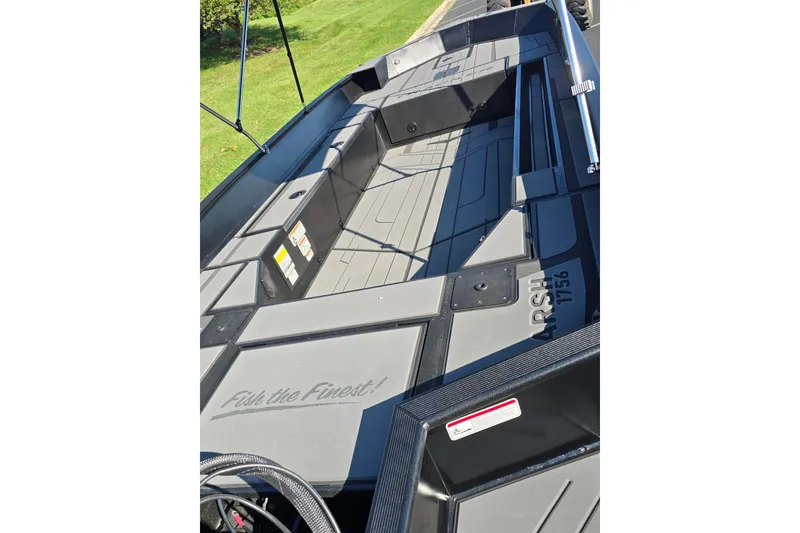 Slide: The Image of 2027 Tracker Grizzly 1756 T Marsh boat interior with sleek design and spacious layout. - 65
