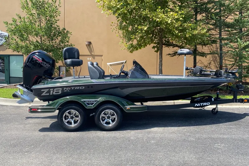 The Image of 2027 Nitro Z18 XL Pro boat parked outdoors, featuring sleek design and modern equipment. - 0