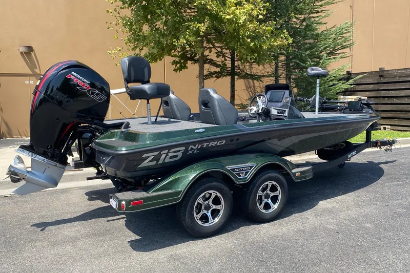 Slide: The Image of 2027 Nitro Z18 XL Pro boat with Mercury Pro XS engine, parked outdoors. - 7