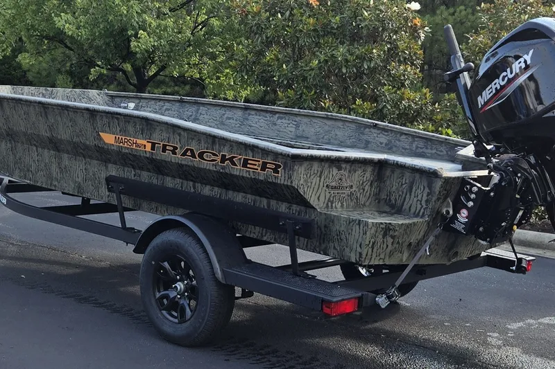 The Image of 2027 Tracker Grizzly 1756 T Marsh boat on trailer with Mercury engine. - 0