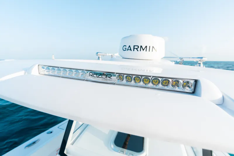 Slide: The Image of 2027 Sportsman Open 302 Center Console with Garmin radar and Lumitec Razor light bar. - 10