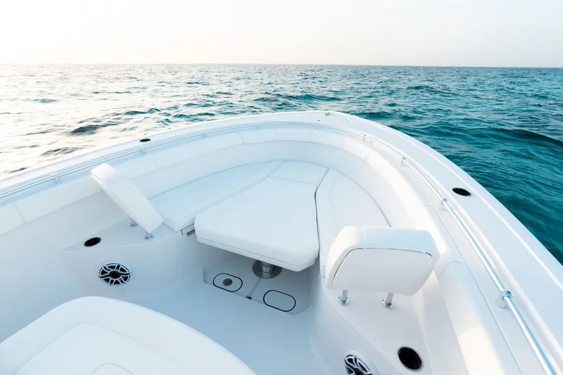 Slide: The Image of 2027 Sportsman Open 302 Center Console boat interior on open sea. - 3