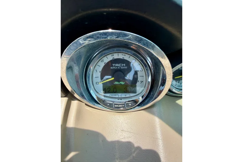 Slide: The Image of Tachometer of 2013 Sea Ray 260 Sundeck displaying RPM readings. - 16
