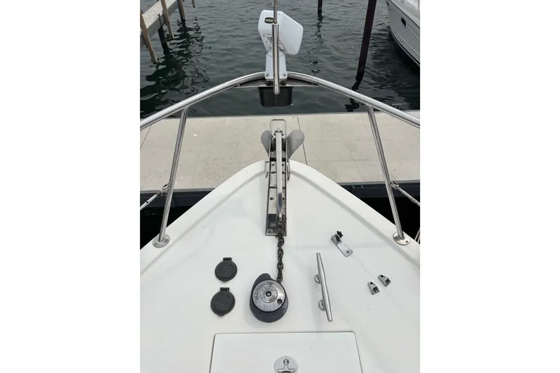Slide: The Image of Bow of 2006 Island Pilot 395 yacht with anchor chain and railing. - 5