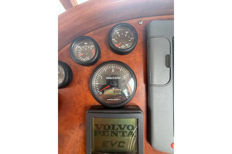 Slide: The Image of Dashboard of a 2006 Island Pilot 395 boat with Volvo Penta gauges. - 23
