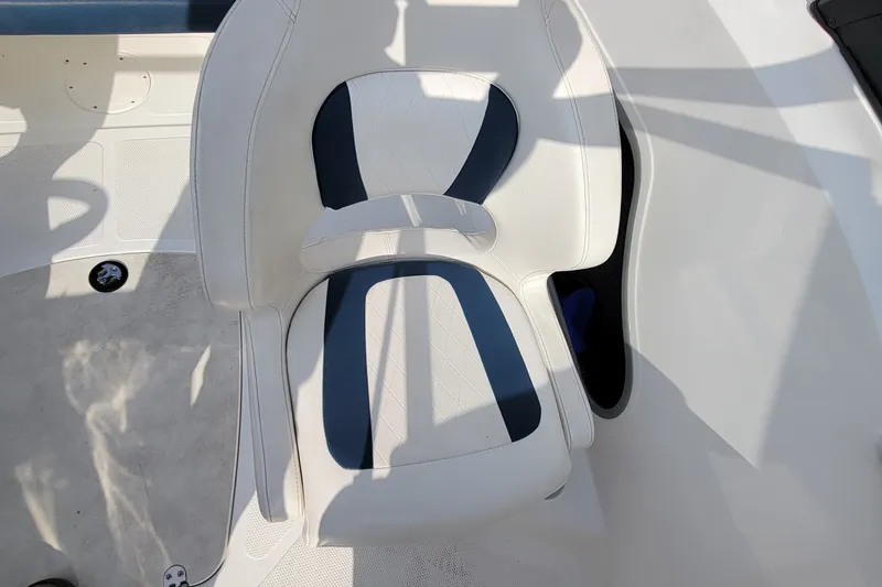Slide: The Image of White and blue seat on 2022 Tahoe 185 S boat, showcasing modern design. - 26