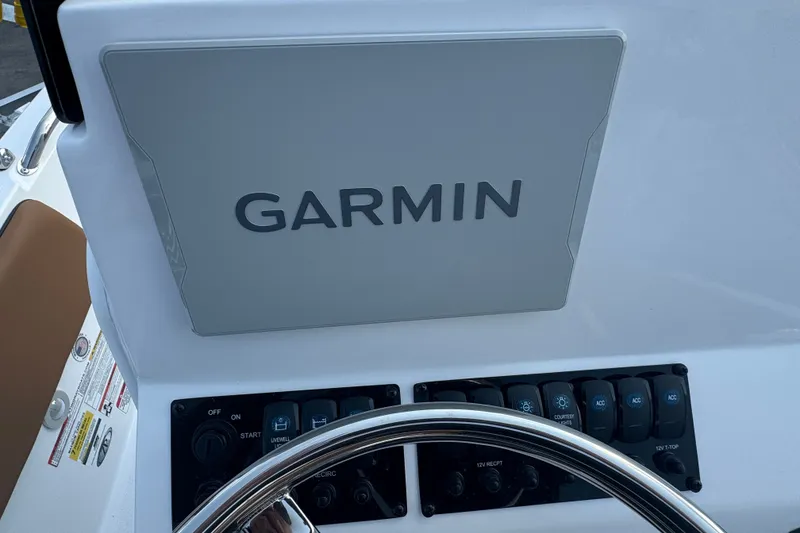 Slide: The Image of Garmin navigation system on 2027 Stingray 17 CC boat dashboard. - 9