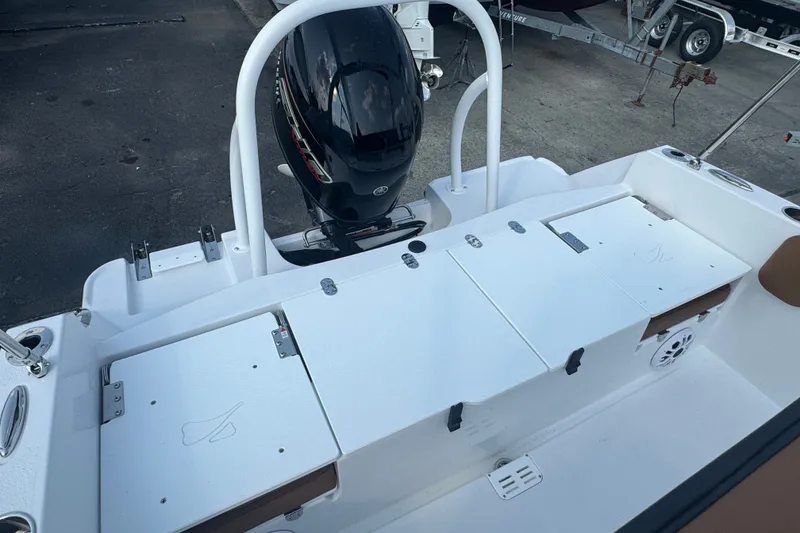 Slide: The Image of 2027 Stingray 17 CC boat with outboard motor and storage compartments. - 3