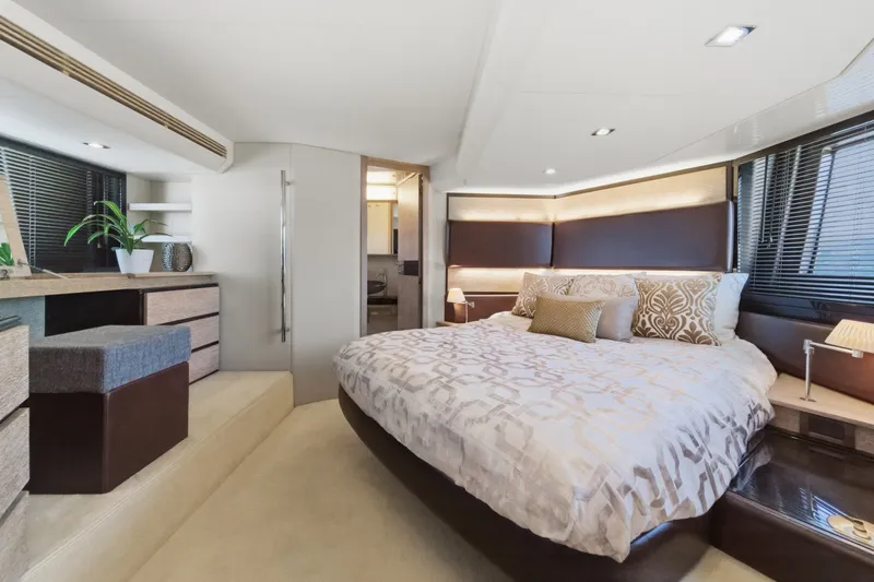 Slide: The Image of Luxurious bedroom interior of 2010 Azimut 58 yacht with modern decor and cozy bedding. - 87