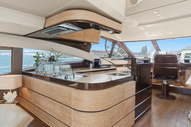 Slide: The Image of Luxurious interior of a 2010 Azimut 58 yacht with modern kitchen and helm. - 67