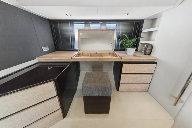 Slide: The Image of Luxurious interior of a 2010 Azimut 58 yacht with modern vanity and decor. - 93