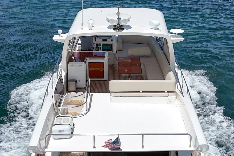 Slide: The Image of Azimut 58 yacht cruising on open water, rear view, 2010 model. - 36