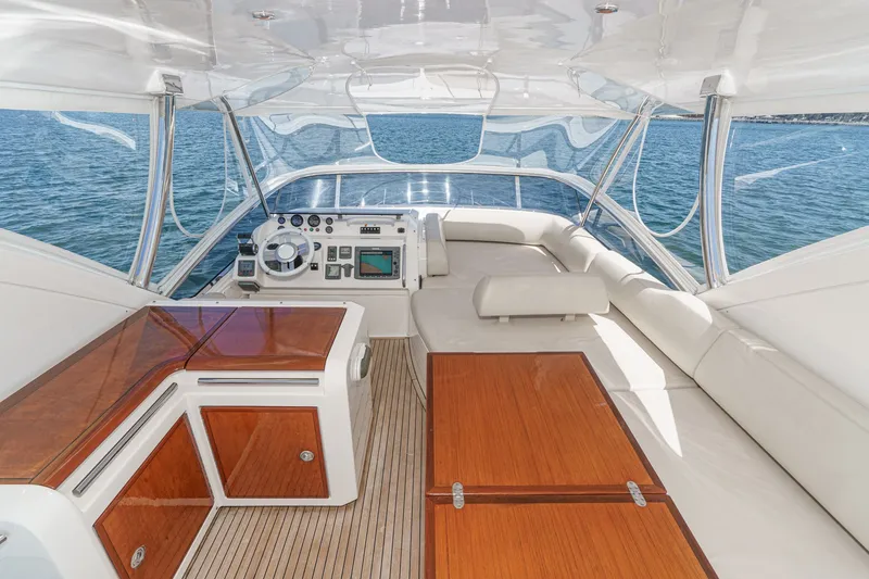Slide: The Image of Luxurious interior of 2010 Azimut 58 yacht with elegant wood finishes and modern controls. - 39