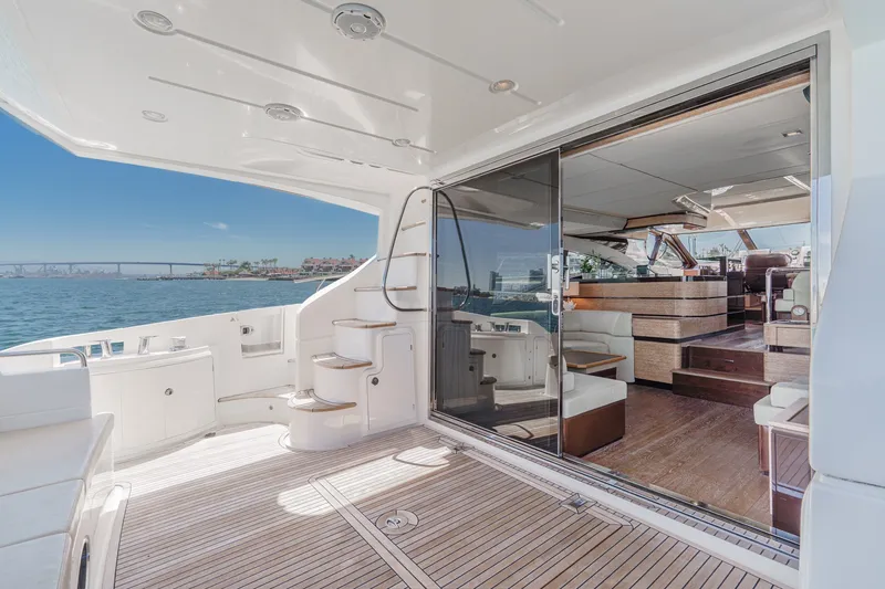Slide: The Image of Luxurious 2010 Azimut 58 yacht interior with elegant wood flooring and scenic ocean view. - 54