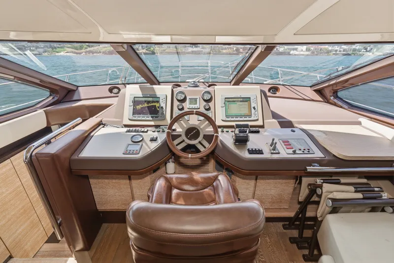 Slide: The Image of Luxurious helm of a 2010 Azimut 58 yacht with advanced navigation systems. - 75
