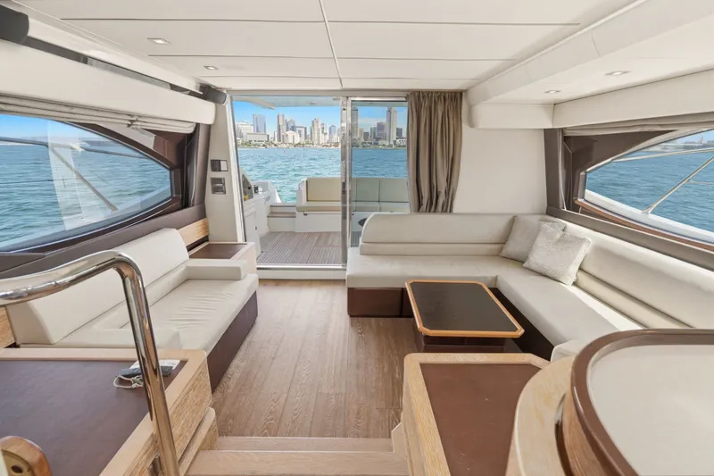 Slide: The Image of Luxurious interior of 2010 Azimut 58 yacht with city skyline view. - 60