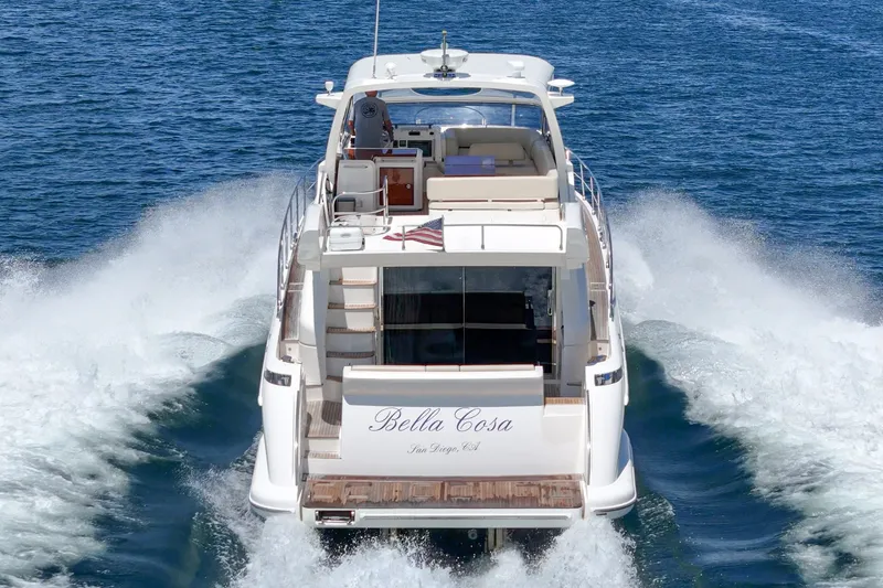 Slide: The Image of 2010 Azimut 58 yacht "Bella Cosa" cruising on open water. - 35
