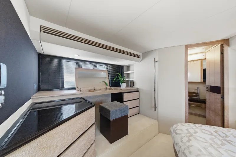 Slide: The Image of Luxurious interior of a 2010 Azimut 58 yacht with modern furnishings and elegant design. - 92