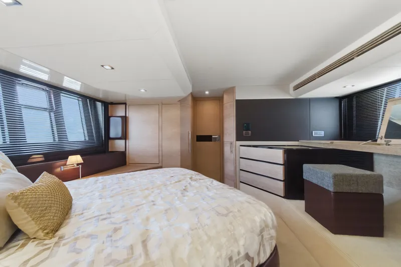 Slide: The Image of Luxurious bedroom interior of 2010 Azimut 58 yacht with modern furnishings. - 91