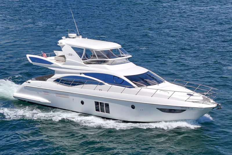 Slide: The Image of Luxurious 2010 Azimut 58 yacht cruising on open water. - 18