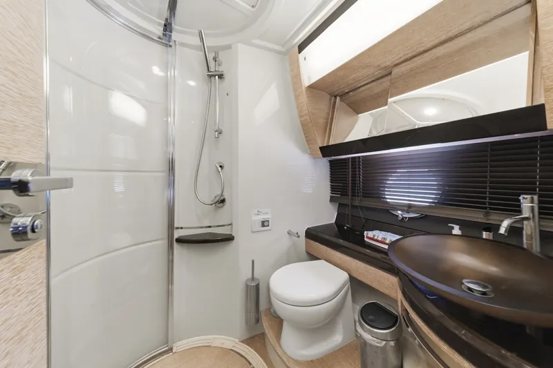 Slide: The Image of Luxurious bathroom in 2010 Azimut 58 yacht with modern fixtures and elegant design. - 83