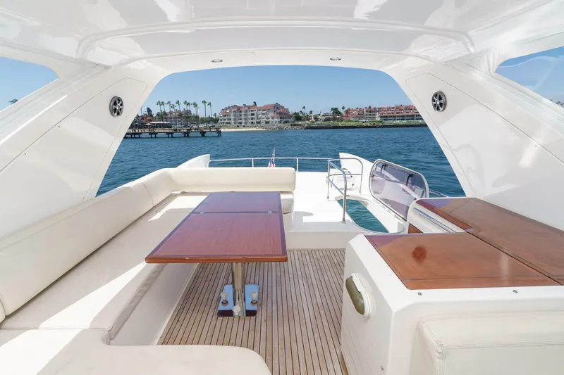 Slide: The Image of Luxurious 2010 Azimut 58 yacht deck with elegant seating and ocean view. - 48