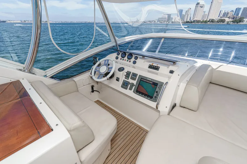 Slide: The Image of Cockpit of 2010 Azimut 58 yacht with city skyline in background. - 41