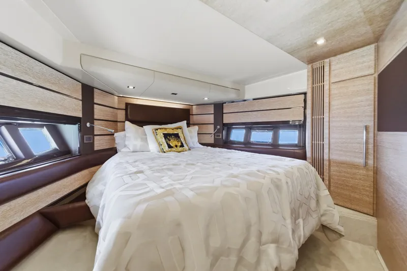Slide: The Image of Luxurious bedroom interior of 2010 Azimut 58 yacht with elegant bedding and modern design. - 81