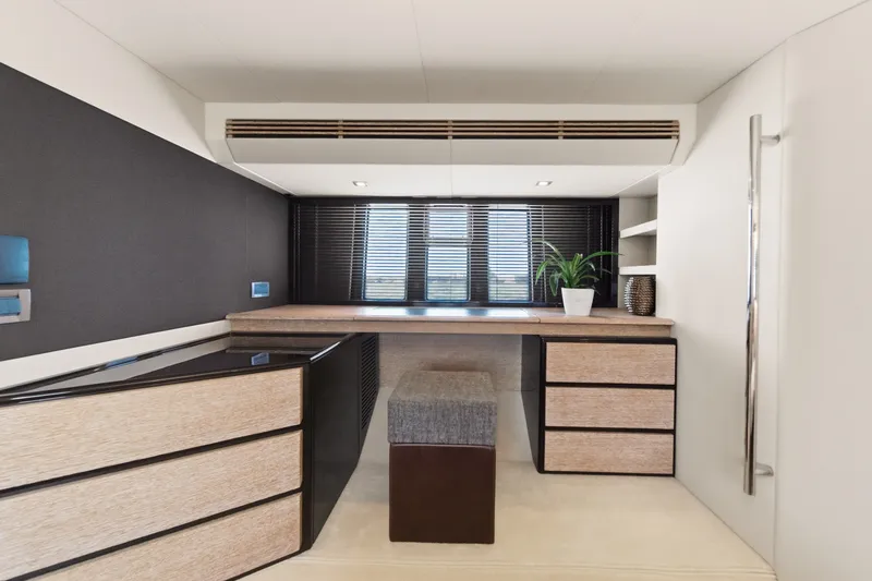 Slide: The Image of Luxurious interior of 2010 Azimut 58 yacht with modern desk and stylish decor. - 94