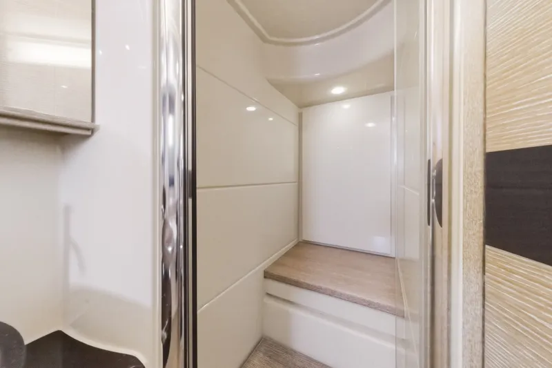 Slide: The Image of Interior of 2010 Azimut 58 yacht, featuring sleek, modern design and elegant finishes. - 96
