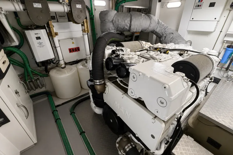 Slide: The Image of Engine room of 2014 Sunseeker Predator 68 yacht, featuring MAN engines and advanced equipment. - 58
