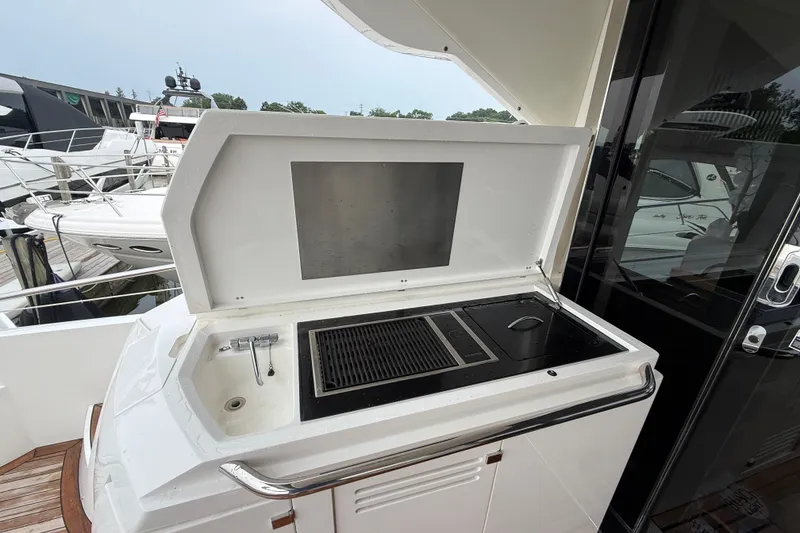 Slide: The Image of Outdoor kitchen on 2014 Sunseeker Predator 68 yacht with grill and sink. - 17