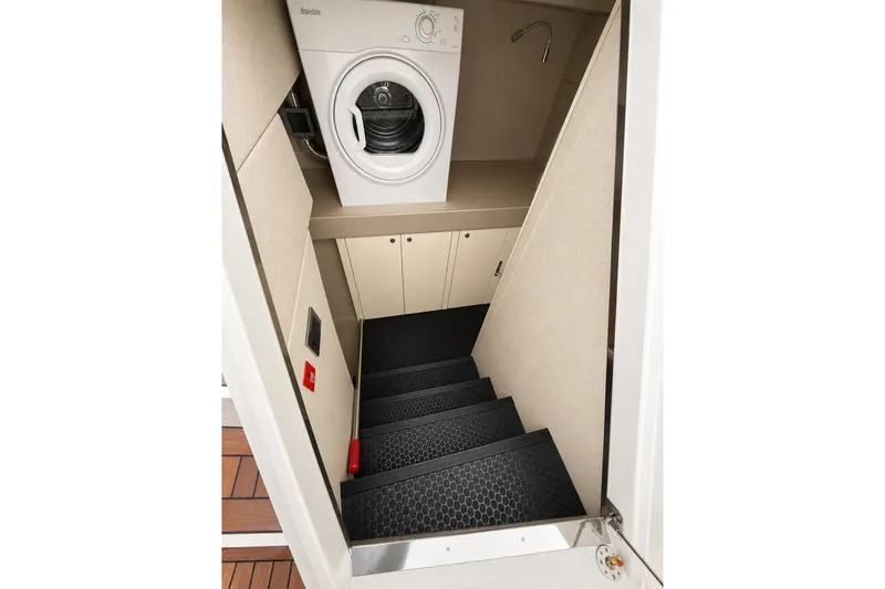 Slide: The Image of Staircase leading to laundry area on 2014 Sunseeker Predator 68 yacht. - 52