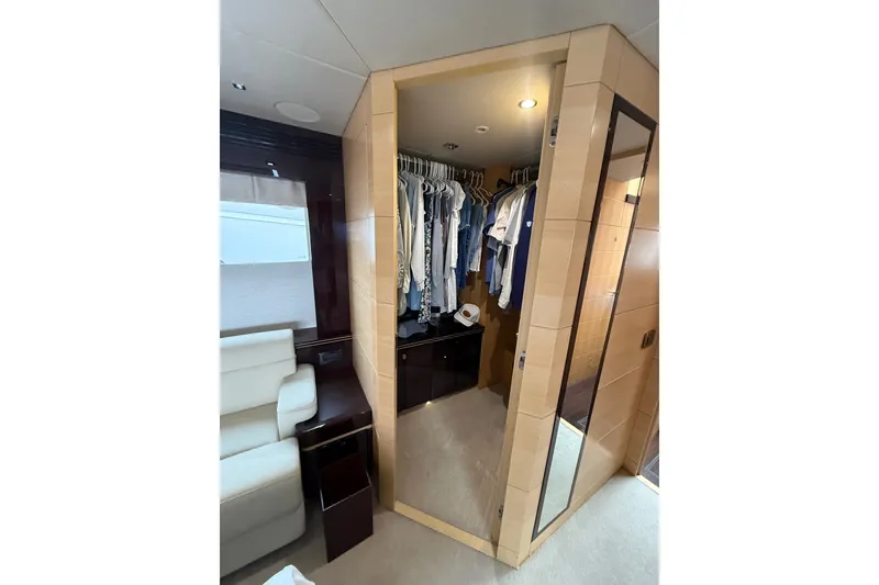 Slide: The Image of Luxurious interior of 2014 Sunseeker Predator 68 yacht with spacious closet. - 41