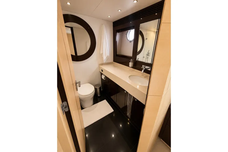 Slide: The Image of Luxurious bathroom on 2014 Sunseeker Predator 68 yacht with modern fixtures and elegant design. - 37