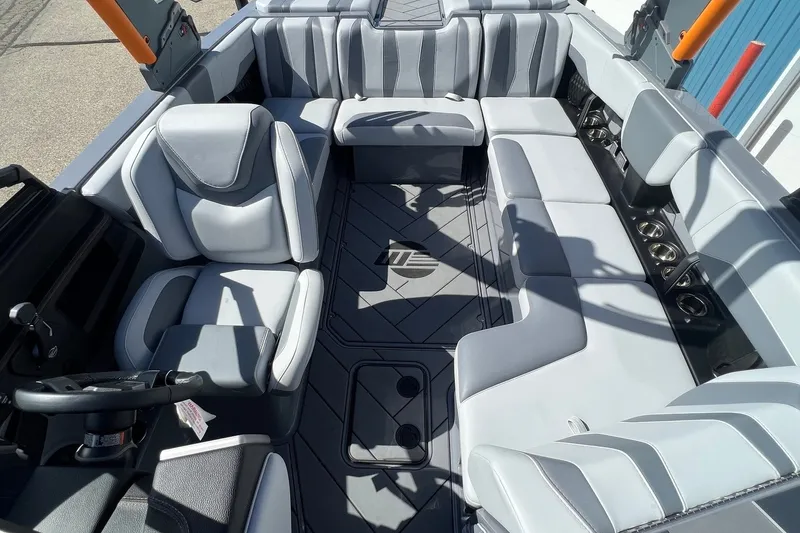 Slide: The Image of 2023 Malibu Wakesetter 22 LSV interior with luxurious seating and modern design. - 25
