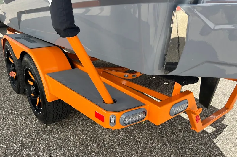 Slide: The Image of 2023 Malibu Wakesetter 22 LSV on orange trailer, close-up view. - 38
