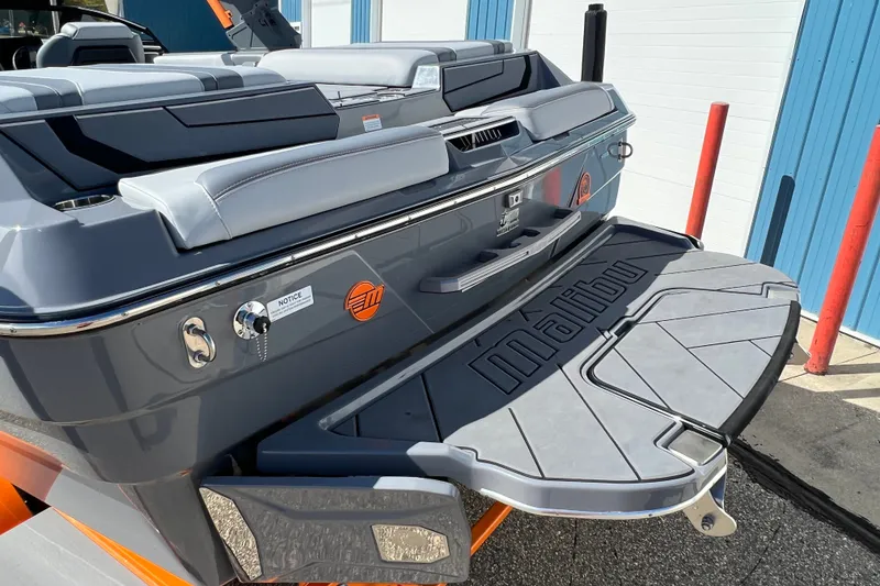 Slide: The Image of 2023 Malibu Wakesetter 22 LSV boat rear view with swim platform. - 33