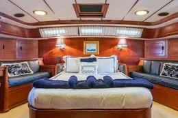 Slide: The Image of Luxurious 1987 Camper & Nicholsons cruising sailboat cabin with elegant wood interior. - 27